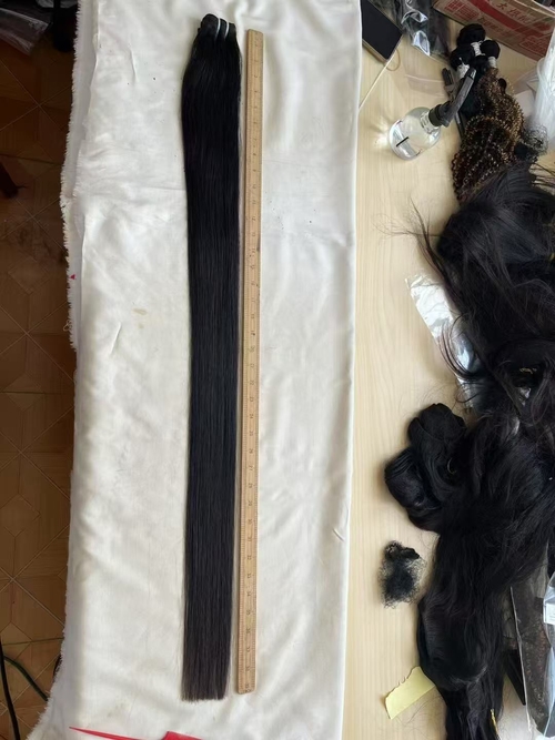 kasus perusahaan terbaru tentang 38 inci 40 inci alami Hitam lurus Virgin Human Hair Bundles